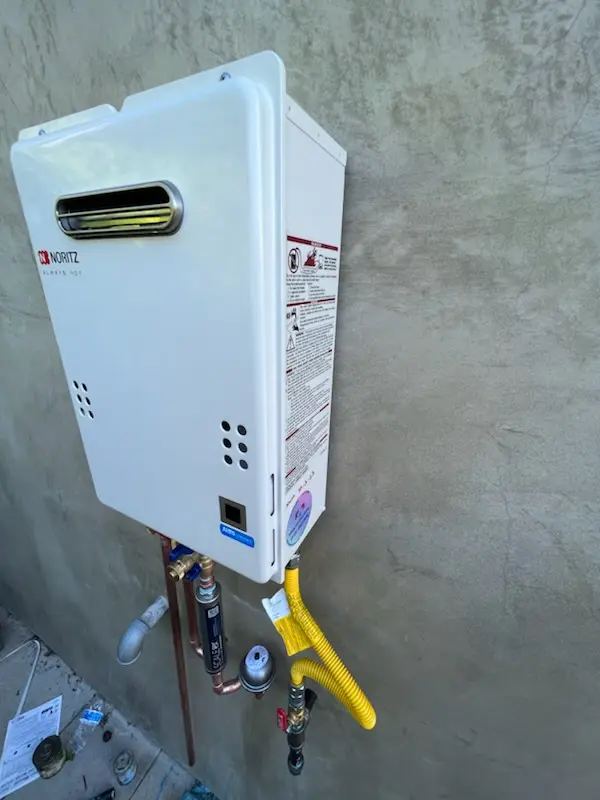 Tankless water heater installation for Thoroughbred Farms homes